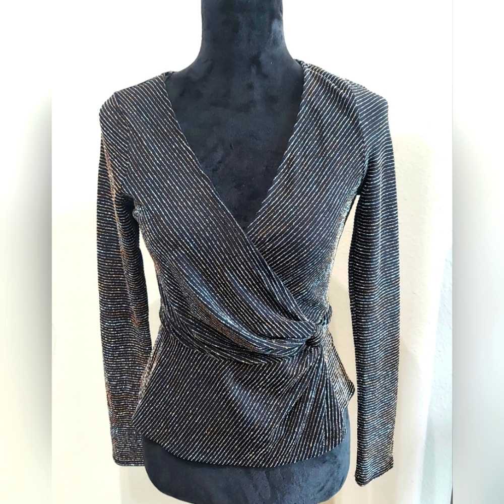 Long sleeve blouse for women.  black color with gold and silver threads